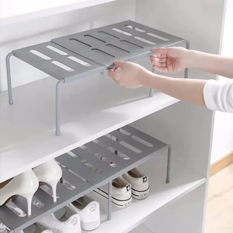 Organisateur de tiroir extensible en ABS blanc sous un évier de cuisine