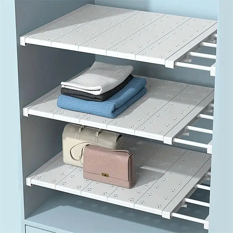 Organisateur de Tiroir & Étagère Extensible Sans Perçage 2 Organisateur de tiroir et étagère extensible blanc installé dans une garde-robe.