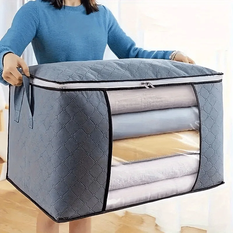 ac de rangement en polyester gris XL avec poignées renforcées pour couettes.