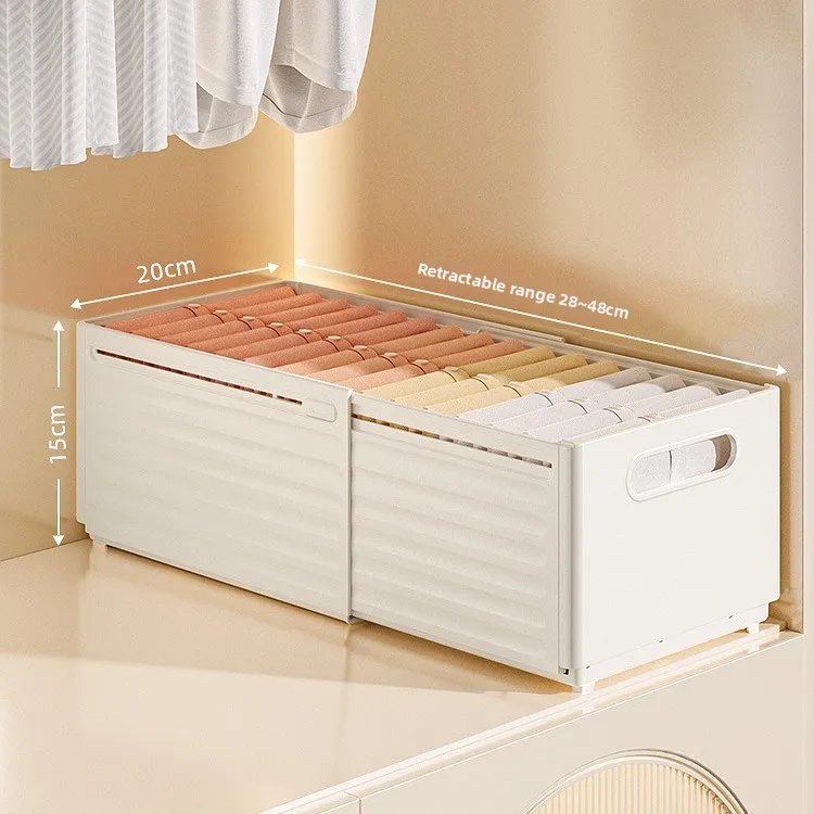 Boîte de Rangement Réglable | Meilleur Organisateur Tiroir Chambre 8 Boîte rétractable blanche étendue au maximum dans un meuble de rangement en bois